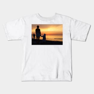 People watching dusk at seaside Kids T-Shirt